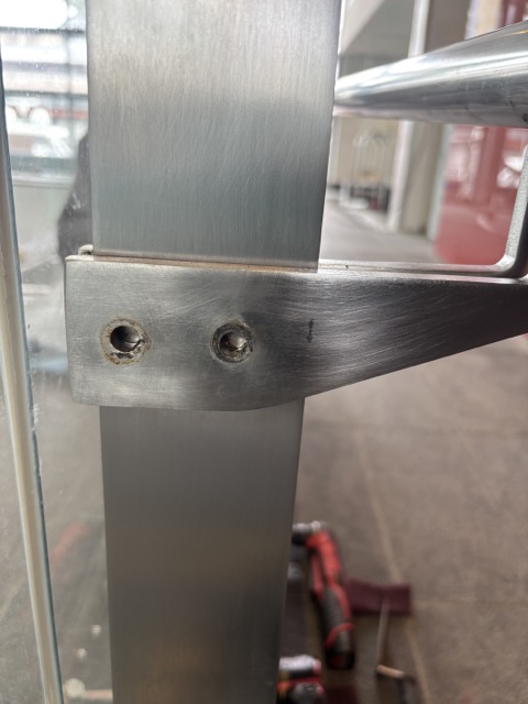 Stainless steel bracket before restoration